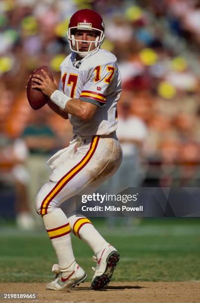 Dave Krieg, Quarterback for the Kansas City Chiefs prepares to throw a downfield pass during the American Football Conference West game against the...