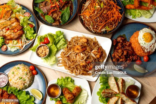 assortment of traditional asian dishes - thai food stock pictures, royalty-free photos & images