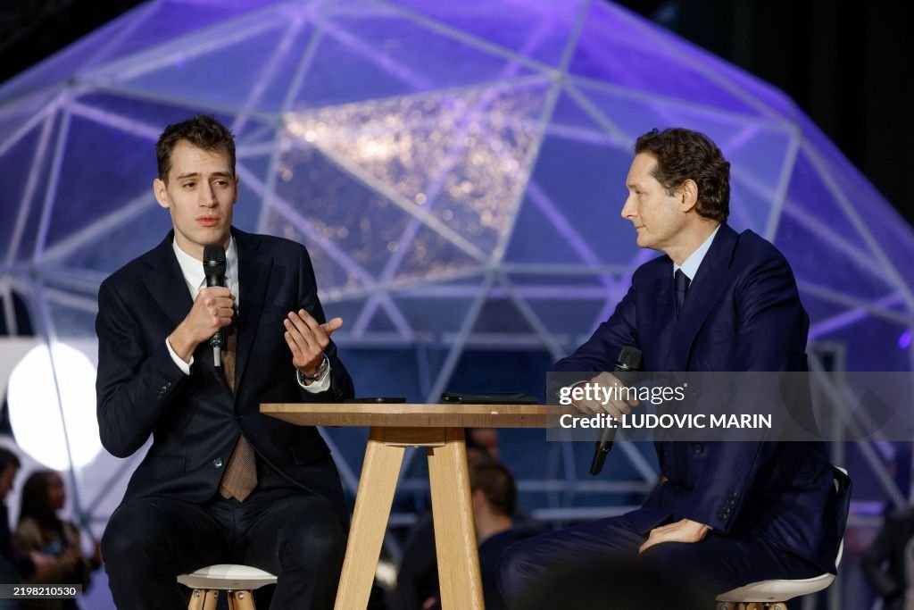 Chariman of Stellantis, chairman of Ferrari and CEO of Exor John ...