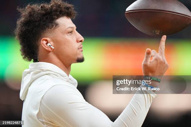Super Bowl LIX: Kansas City Chiefs Patrick Mahomes in action, spins a football on his finger pregame vs Philadelphia Eagles at Caesar's Superdome....