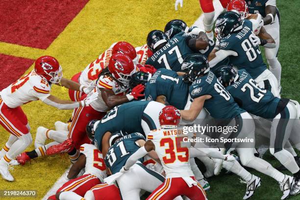 Jalen Hurts of the Philadelphia Eagles gets a tush push for a touchdown during Super Bowl LIX between the Kansas City Chiefs and the Philadelphia...