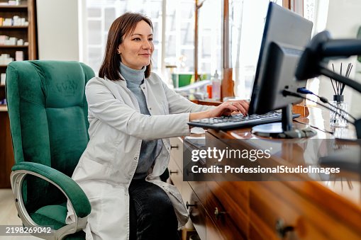 Pharmacist Computer Pharmacist Working On A Computer In A Wellorganized Pharmacy Interior ...