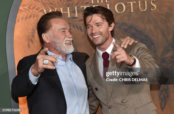 Actor Patrick Schwarzenegger with his father Austrian-US actor Arnold Schwarzenegger attend the season three premiere of HBO's "The White Lotus" at...