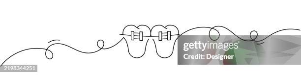 one continuous line drawing of dental braces icon. single line vector illustration - dentist stock illustrations