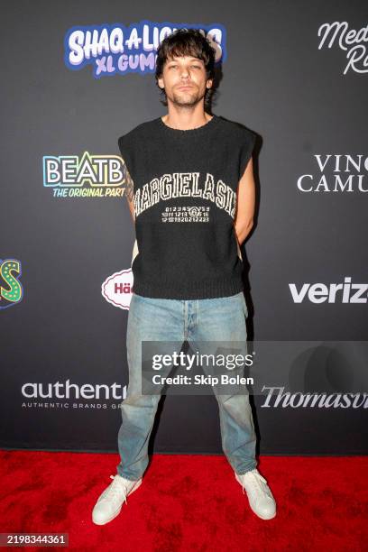 English singer-songwriter and member of the boy band One Direction, Louis Tomlinson arrives at Shaq's Fun House at Mardi Gras World on February 7,...