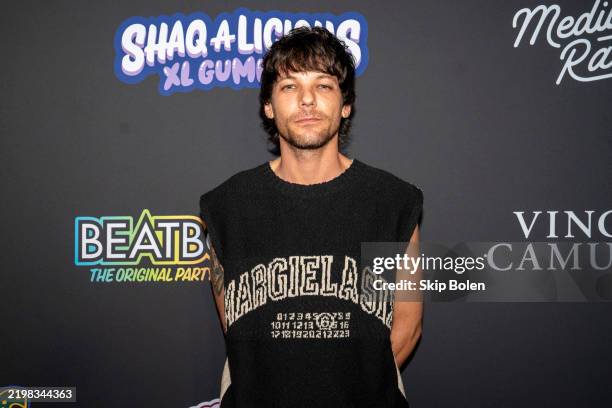English singer-songwriter and member of the boy band One Direction, Louis Tomlinson arrives at Shaq's Fun House at Mardi Gras World on February 7,...