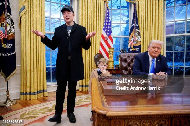 Tesla and SpaceX CEO Elon Musk, accompanied by U.S. President Donald Trump , and his son X Musk, speaks during an executive order signing in the Oval...
