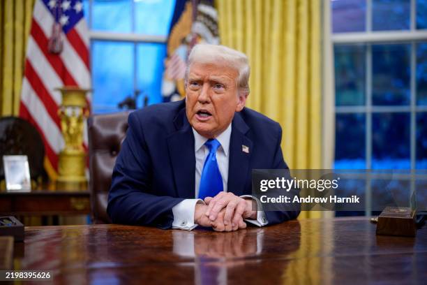 President Donald Trump speaks during an executive order signing in the Oval Office at the White House on February 11, 2025 in Washington, DC. Trump...