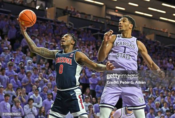 Jaden Bradley of the Arizona Wildcats drives to the basket against David N'Guessan of the Kansas State Wildcats in the first half at Bramlage...