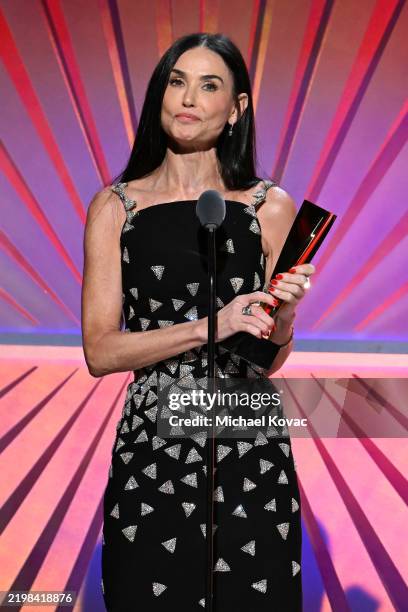 Demi Moore accepts the Best Actress award for "The Substance" onstage during AARP's Annual Movies For Grownups award for "The Substance"s at the...