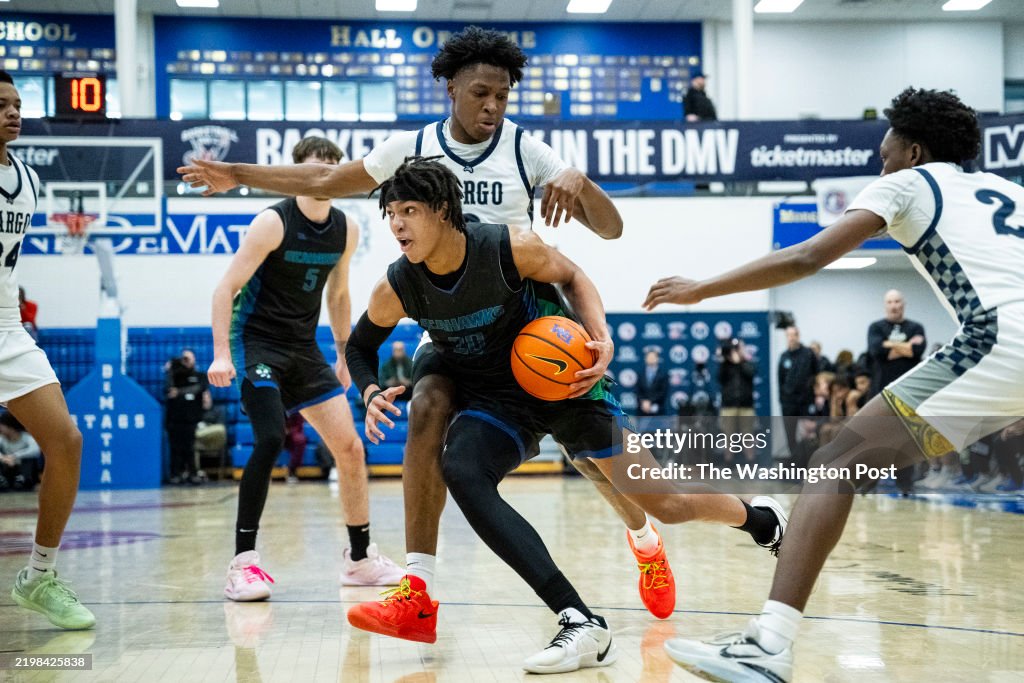 South Lakes G Jordan Scott dribbles past Largo F Cam Ward , during a