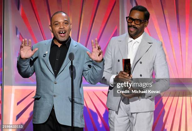 Clarence Maclin and Colman Domingo accept the Best Ensemble award for "Sing Sing" onstage during AARP's Annual Movies For Grownups Awards at the...