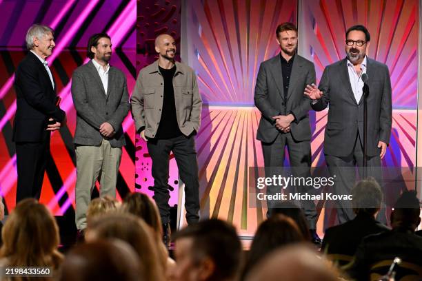 Alex Heineman, Fred Berger, Boyd Holbrook and James Mangold accept the Best Movie for Grownups award for "A Complete Unknown" from Harrison Ford...
