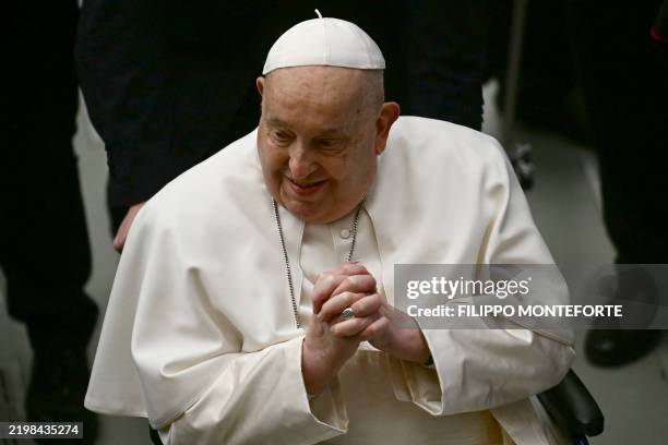 Pope Francis greets people at the end of the weekly general audience on February 12, 2025 at Paul-VI hall in The Vatican.