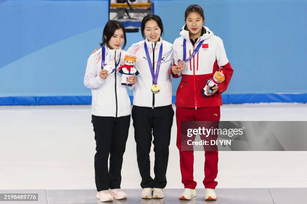 Gold medal winners Choi Minjeong of South Korea silver medal winners Park Kim Gilli of South Korea and bronze medal winners Zhang Chutong of China...