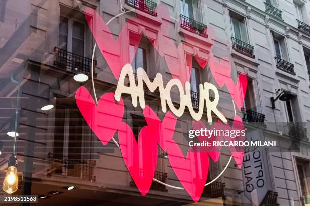 Illustration of Valentine s Day in Paris, France, on February 12, 2025. A window of a chocolate shop with the word LOVE . Saint Valentin.