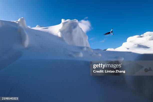 Li Xinpeng of China competes during the Freestyle Skiing-Men's Aerials Final on day 3 of the 9th Asian Winter Games in Yabuli on February 09, 2025 in...