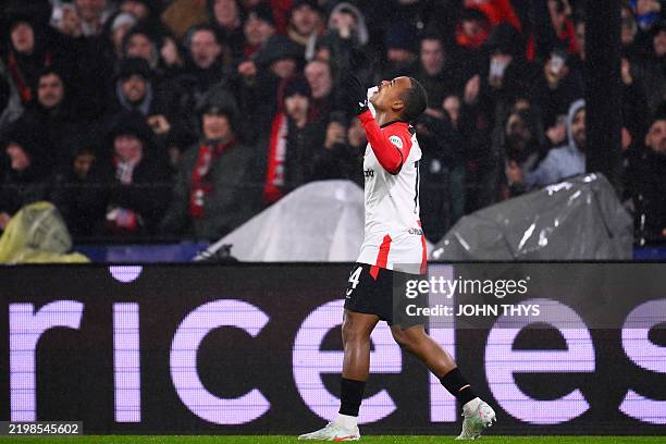 Feyenoord's Brazilian forward Igor Paixao celebrates after scoring the opening goal during the UEFA Champions League knockout phase play-off 1st leg...