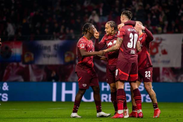 Xavi Simons of RB Leipzig and his team mates celebrate their goal during the Bundesliga match between RB Leipzig and FC St. Pauli 1910 at Red Bull...
