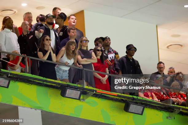 Ed Kelce, Ashley Avignone, Alana Haim, Ross Travis, Taylor Swift, Este Haim, Danielle Haim and Donna Kelce attend Super Bowl LIX at Caesars Superdome...