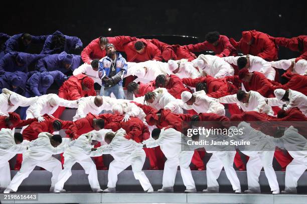 Kendrick Lamar performs onstage during Apple Music Super Bowl LIX Halftime Show at Caesars Superdome on February 09, 2025 in New Orleans, Louisiana.
