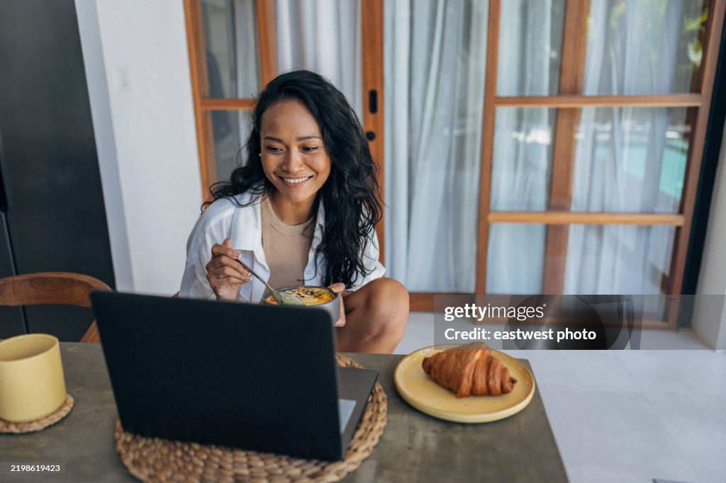 Indonesian woman enjoying her healthy breakfast