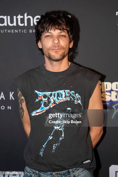 Singer-songwriter Louis Tomlinson arrives at the Sports Illustrated's SI The Party at Mardi Gras World on February 8, 2025 in New Orleans, Louisiana.