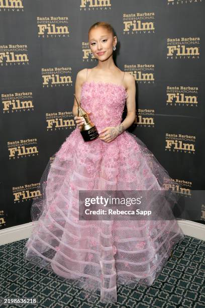 Honoree Ariana Grande poses with her Virtuosos Award during the 40th Santa Barbara International Film Festival at The Arlington Theatre on February...