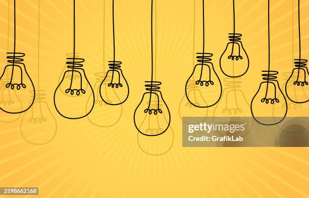 creative light bulb design on yellow background - yellow studio background stock illustrations