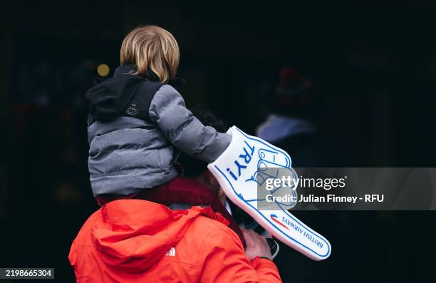 Fan with a foam finger is seen prior to the Guinness Six Nations 2025 match between England and France at Allianz Stadium on February 08, 2025 in...