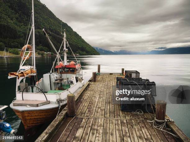 fishing boat in vikoyri norway - recreational boat stock pictures, royalty-free photos & images