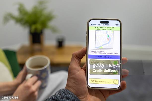 using a parcel tracking service - delivery tracking app stock pictures, royalty-free photos & images