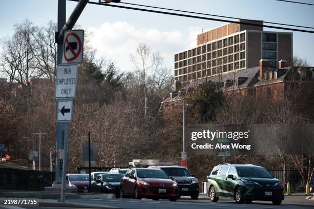 Sign that reads "NIH Employees Only" stands near an entrance at the National Institute of Health on February 10, 2025 in Bethesda, Maryland. Attorney...