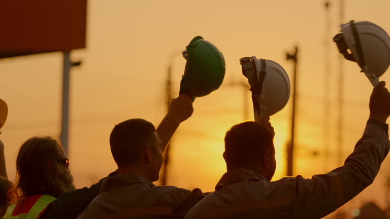 https://media.gettyimages.com/id/2198788321/video/engineers-smiling-together-in-the-evening-sunlight.jpg?b=1&s=640x640&k=20&c=kZu8xz34GrtDC_1epFWR5CvoTIEslxCtKusea4wXZFQ=