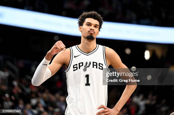 Victor Wembanyama of the San Antonio Spurs celebrates after a 131-121 victory against the Washington Wizards at Capital One Arena on February 10,...