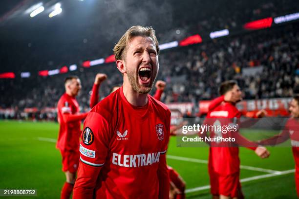 Twente midfielder Michel Vlap celebrates the goal of FC Twente forward Ricky van Wolfswinkel, making the score 2-1, during the match between Twente...