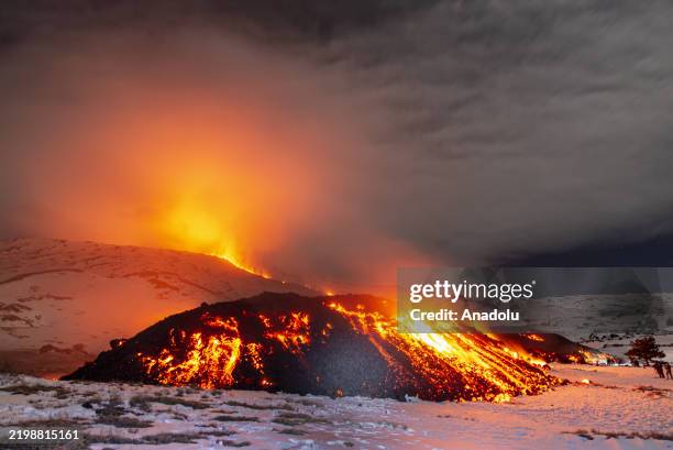 View of Mount Etna seen from Adrano, Catania, which is producing a new eruption on 14 February 2025. A lava flow emerged from a fissure at about...