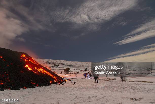 View of Mount Etna seen from Adrano, Catania, which is producing a new eruption on 14 February 2025. A lava flow emerged from a fissure at about...