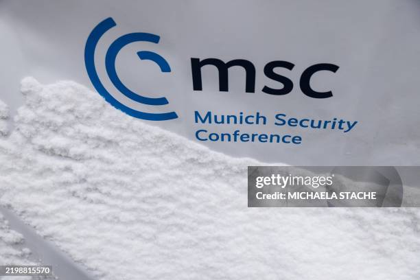Snow lies next to the logo of the the 61st Munich Security Conference in Munich, southern Germany on February 14, 2025.