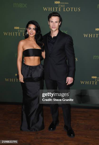 Arnas Fedaravicius and Emeraude Toubia arrives at the Los Angeles Premiere Of HBO Original Series "The White Lotus" Season 3 at Paramount Theatre on...