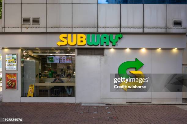 subway restaurant in kowloon, hong kong - sandwich advertising stock pictures, royalty-free photos & images