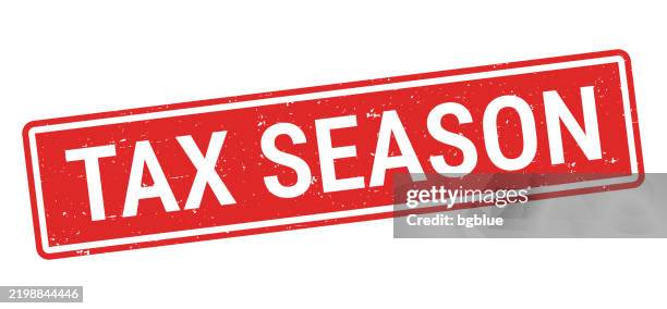tax season - red rubber stamp on white background - tax time stock illustrations