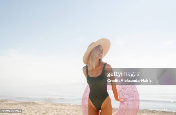 summer on the beach - swimming costume stock pictures, royalty-free photos & images