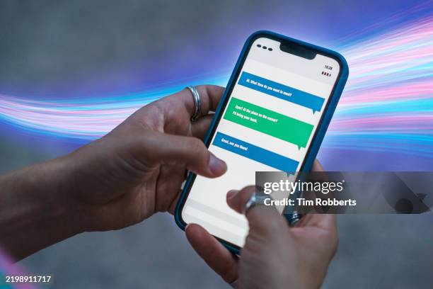 close up of woman using smart phone with light streak - smartphone text message screen stock-fotos und bilder