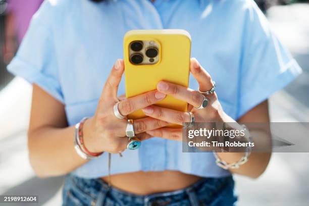 close up of woman using smart phone - mobile phone stock pictures, royalty-free photos & images
