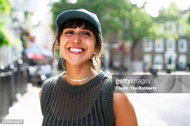 woman laughing and looking off camera - generation y bildbanksfoton och bilder