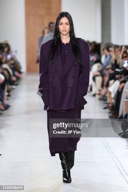 Amelia Gray walks the runway during the Michael Kors Collection Fall/Winter 2025 Runway Show at Terminal Warehouse on February 11, 2025 in New York...