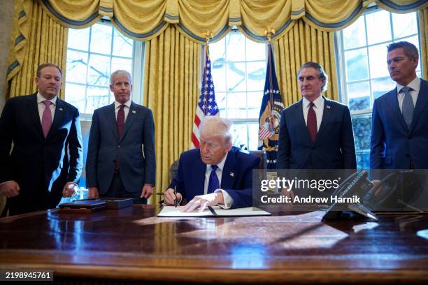 President Donald Trump, accompanied by Environmental Protection Agency Administrator Lee Zeldin, Energy Secretary Chris Wright, Interior Secretary...