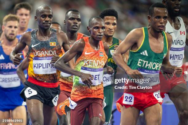 Jacob Kiplimo of Uganda, Benard Kibet of Kenya and Berihu Aregawi of Ethiopia in action in the Men's 10,000m Final during the Athletics Competition...