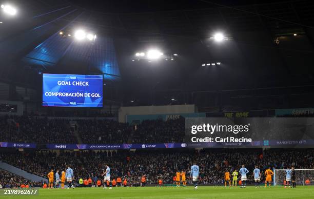 General view inside the stadium as the LED screen displays that a VAR goal check is underway for the goal scored by Erling Haaland of Manchester City...